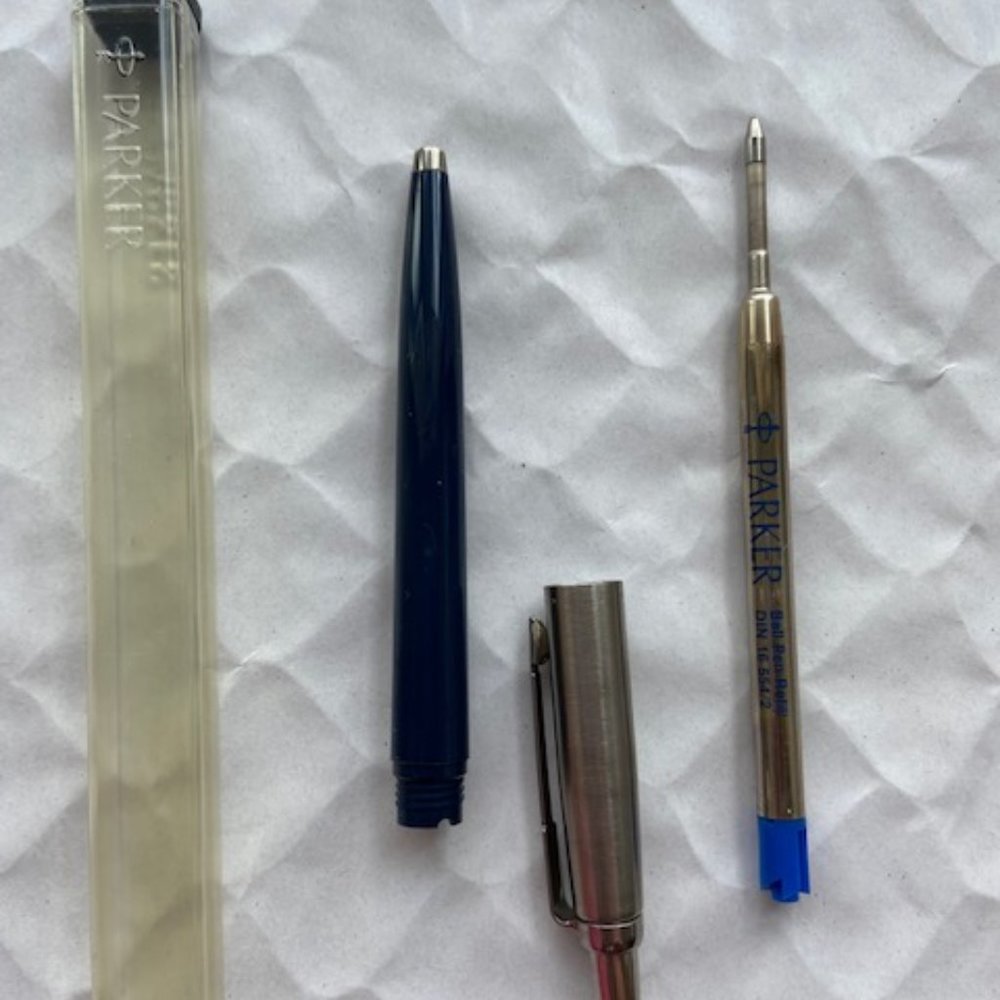 - Parker writing pen with original Parker refill